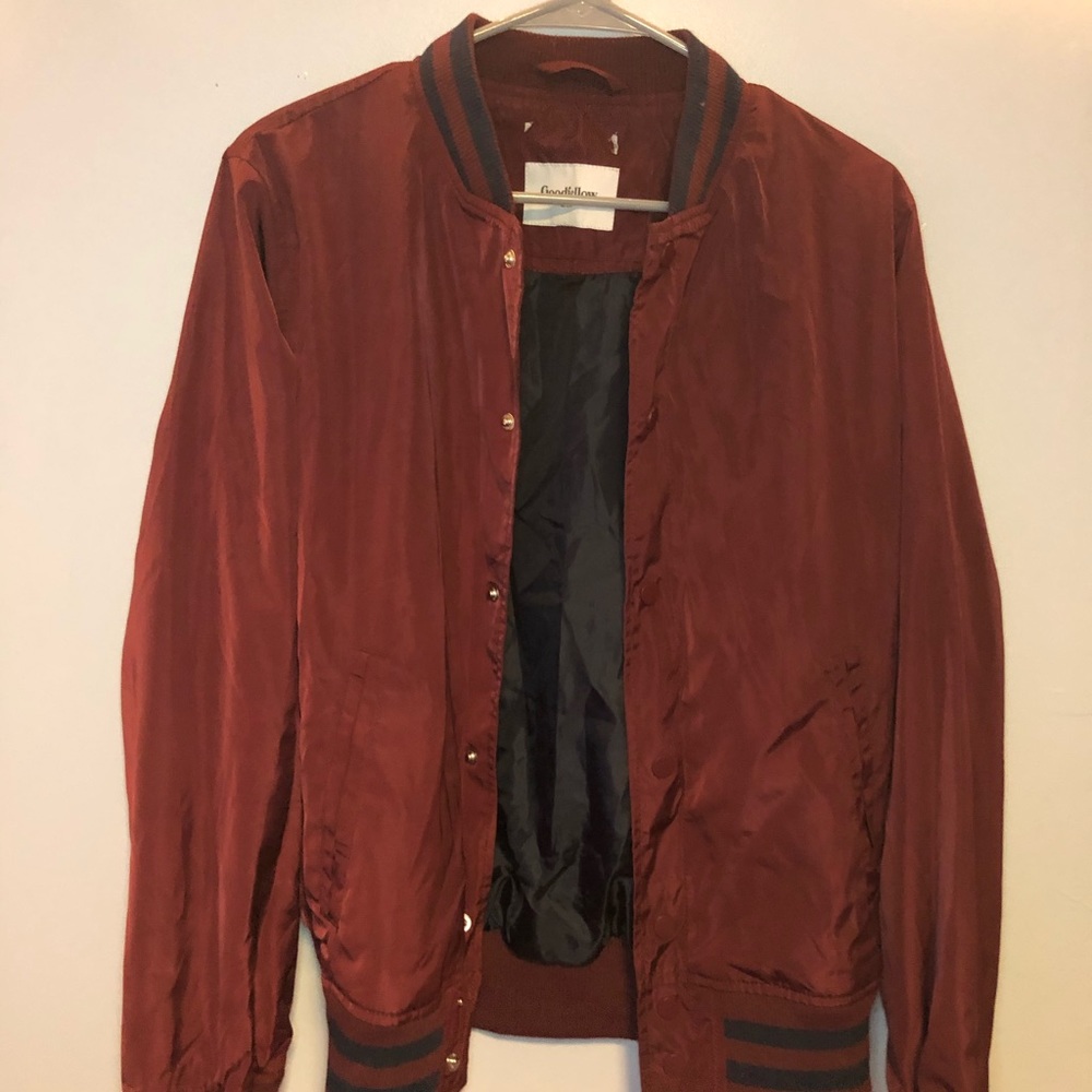 maroon jacket with striped cuffs